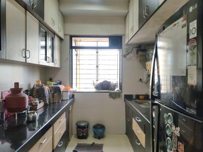 Kitchen Image of 950 Sq.ft 2 BHK Apartment / Flat for sale in Lodha Paradise, Thane West Thane for Rs. 16900000