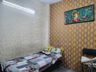 Bedroom Image of 700 Sq.ft 2 BHK Builder Floor for rent in Begumpur New Delhi for Rs. 27000