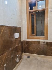 Common Bathroom Image of 675 Sq.ft 2 BHK Apartment / Flat for sale in Dwarka Mor New Delhi for Rs. 6500000