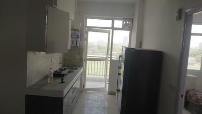 Kitchen Image of 682 Sq.ft 2 BHK Apartment / Flat for rent in Suncity Avenue 76, Sector 76 Gurgaon for Rs. 25000