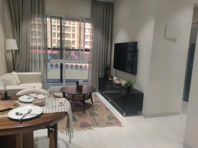 Living Room Image of 1090 Sq.ft 2 BHK Apartment / Flat for sale in Origin Wisteria Square, Mira Road East Mira Bhayandar for Rs. 9300000