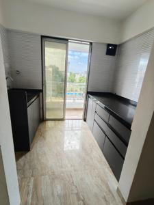 Kitchen Image of 700 Sq.ft 2 BHK Apartment / Flat for sale in Kishor Vatika, Warje Pune for Rs. 6500000