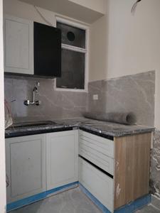 Kitchen Image of 550 Sq.ft 1 BHK Apartment / Flat for rent in GS Real Estate , Chhattarpur New Delhi for Rs. 14000