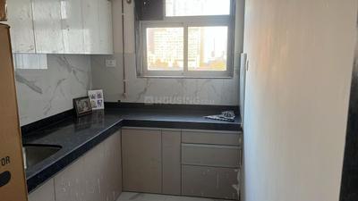 Kitchen Image of 550 Sq.ft 2 BHK Apartment / Flat for sale in Trolochan CHS, Sion Mumbai for Rs. 18500000