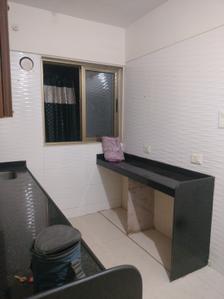 Kitchen Image of 660 Sq.ft 1 BHK Apartment / Flat for sale in Vishesh Balaji Symphony, Shilottar Raichur Navi Mumbai for Rs. 5300000