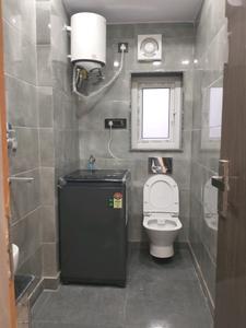 Common Bathroom Image of 367 Sq.ft 1 RK Apartment / Flat for rent in DLF Capital Greens, Karampura New Delhi for Rs. 24000