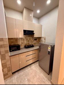 Kitchen Image of 650 Sq.ft 1 BHK Builder Floor for rent in Sector 52 Gurgaon for Rs. 29000