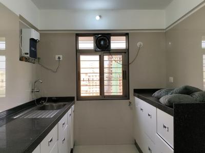 Kitchen Image of 850 Sq.ft 2 BHK Apartment / Flat for rent in Princecare Zinnia, Mahim Mumbai for Rs. 140000