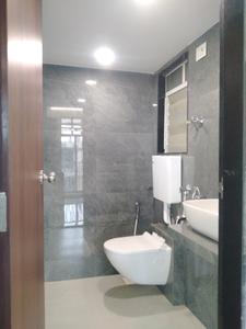 Common Bathroom Image of 600 Sq.ft 1 BHK Apartment / Flat for sale in Shripal Sattva, Mulgaon Vasai for Rs. 4492800