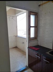Kitchen Image of 1100 Sq.ft 2 BHK Apartment / Flat for rent in Amrut Orchid, Chandkheda Ahmedabad for Rs. 22000