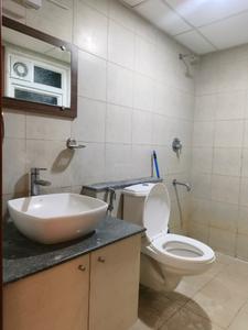 Common Bathroom Image of 1634 Sq.ft 3 BHK Apartment / Flat for rent in Bhartiya Nikoo Homes Phase 2, Tirumanahalli Bengaluru for Rs. 49000