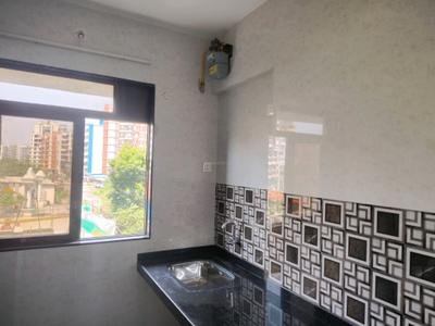 Kitchen Image of 550 Sq.ft 1 BHK Apartment / Flat for rent in Puraniks Kanchan Pushp Society, Kasarvadavali Thane for Rs. 19000