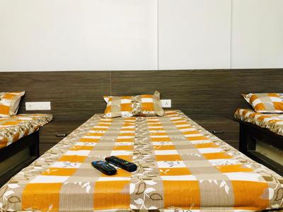 Bedroom Image of Kanu PG in Memnagar, Ahmedabad