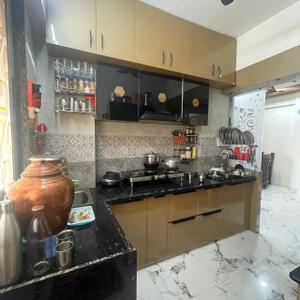 Kitchen Image of 1575 Sq.ft 3 BHK Apartment / Flat for sale in Saket Heaven, Nana Chiloda Ahmedabad for Rs. 5300000