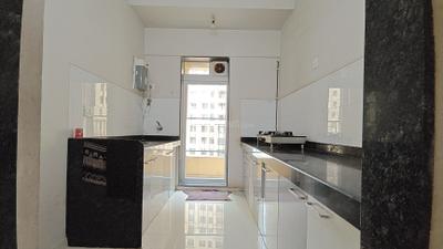 Kitchen Image of 985 Sq.ft 2 BHK Apartment / Flat for sale in Rustomjee Azziano, Thane West Thane for Rs. 12800000
