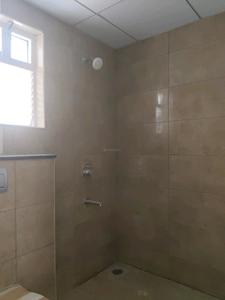 Common Bathroom Image of 1040 Sq.ft 2 BHK Apartment / Flat for sale in Rainbow Chetna, Red Hills Chennai for Rs. 9100000