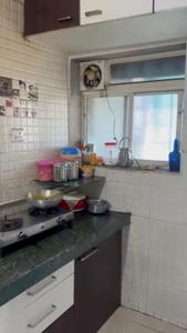 Kitchen Image of 570 Sq.ft 1 BHK Apartment / Flat for sale in Koteshwar Nagar Valsad for Rs. 900000