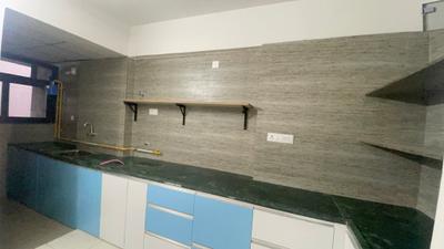 Kitchen Image of 878 Sq.ft 2 BHK Apartment / Flat for rent in Kavisha Aer, Shela Ahmedabad for Rs. 26000