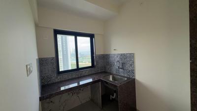 Kitchen Image of 600 Sq.ft 1 BHK Apartment / Flat for rent in Pagarani Universal Universal Cubical, Jogeshwari West Mumbai for Rs. 45000