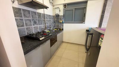 Kitchen Image of 730 Sq.ft 1.5 BHK Builder Floor for rent in Amanora Future Towers, Hadapsar Pune for Rs. 40000