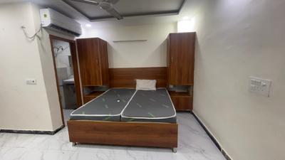 Bedroom Image of 450 Sq.ft 1 RK Independent House for rent in DLF Phase 3 Gurgaon for Rs. 16000