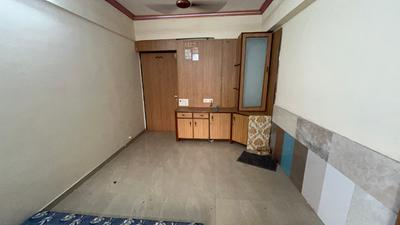Living Room Image of 560 Sq.ft 1 BHK Apartment / Flat for sale in Suyash Tower, Kopar Khairane Navi Mumbai for Rs. 9900000
