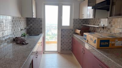 Kitchen Image of 1700 Sq.ft 3 BHK Apartment / Flat for rent in Puri Diplomatic Greens, Sector 110A Gurgaon for Rs. 52000