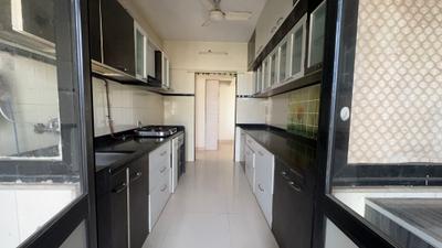 Kitchen Image of 900 Sq.ft 2 BHK Apartment / Flat for rent in Kulswamini Goraksha Dham, Borivali East Mumbai for Rs. 50000