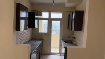 Kitchen Image of 1000 Sq.ft 2 BHK Apartment / Flat for rent in Amrapali Silicon City, Sector 76 Noida for Rs. 29000