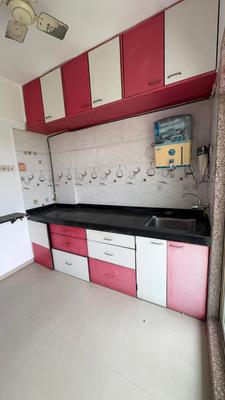 Kitchen Image of 950 Sq.ft 2 BHK Apartment / Flat for sale in Manohar Shreeji Nirvana II, Badlapur East Badlapur for Rs. 4000000