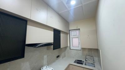 Kitchen Image of 816 Sq.ft 2 BHK Builder Floor for rent in Janakpuri New Delhi for Rs. 35500