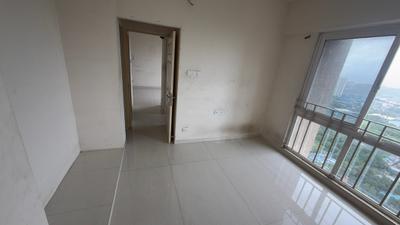 Bedroom Image of 664 Sq.ft 1 BHK Apartment / Flat for rent in Vijay Orovia, Hiranandani Estate Thane for Rs. 23000