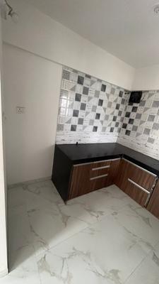 Kitchen Image of 860 Sq.ft 2 BHK Apartment / Flat for rent in Choice Goodwill Meadows Phase 1, Lohegaon Pune for Rs. 20000