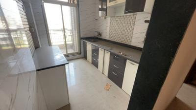 Kitchen Image of 1030 Sq.ft 2 BHK Apartment / Flat for sale in Mohan Willows II, Badlapur East Badlapur for Rs. 3950000