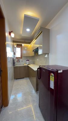 Kitchen Image of 450 Sq.ft 1 BHK Builder Floor for rent in Dwarka Mor New Delhi for Rs. 16500