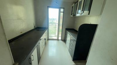 Kitchen Image of 1100 Sq.ft 2.5 BHK Apartment / Flat for rent in Dheeraj Jade Residences , Wagholi Pune for Rs. 25000