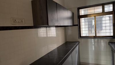 Kitchen Image of 1235 Sq.ft 2 BHK Apartment / Flat for sale in Concrete Sai Swar, Kharghar Navi Mumbai for Rs. 14000000