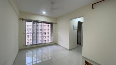 Living Room Image of 550 Sq.ft 1 BHK Apartment / Flat for sale in Godrej Nest, Kandivali East Mumbai for Rs. 10300000