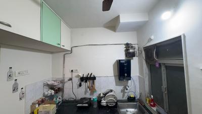 Kitchen Image of 600 Sq.ft 1 BHK Apartment / Flat for sale in Puraniks Kanchan Pushp Society, Kasarvadavali Thane for Rs. 6300000
