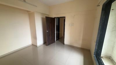 Bedroom Image of 573 Sq.ft 1 BHK Apartment / Flat for rent in Ram Laxman Sadguru Residency, Shilphata Thane for Rs. 11000