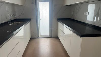 Kitchen Image of 780 Sq.ft 2 BHK Apartment / Flat for sale in Ruparel Ariana, Wadala Mumbai for Rs. 38000000