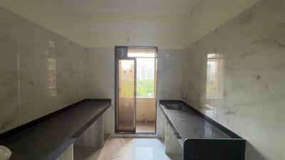 Kitchen Image of 595 Sq.ft 1 BHK Apartment / Flat for sale in Shriraam Pushpanjali Residency, Thane West Thane for Rs. 6800000