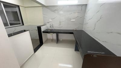 Kitchen Image of 1200 Sq.ft 2 BHK Apartment / Flat for sale in Ravet Pune for Rs. 7300000