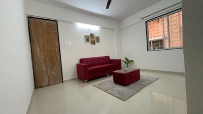 Living Room Image of 550 Sq.ft 1 BHK Apartment / Flat for rent in Wadgaon Sheri Pune for Rs. 25000
