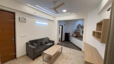 Living Room Image of 714 Sq.ft 1 BHK Apartment / Flat for sale in Nimbus The Golden Palms Tower O, Sector 168 Noida for Rs. 8300000