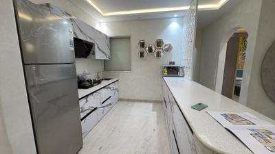 Kitchen Image of 650 Sq.ft 2 BHK Apartment / Flat for sale in Raunak Centrum, Chembur Mumbai for Rs. 15500000