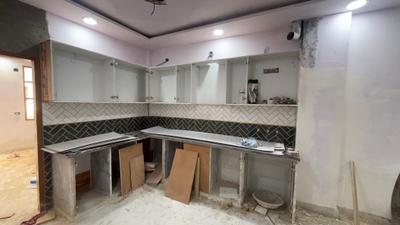 Kitchen Image of 1040 Sq.ft 3 BHK Apartment / Flat for sale in Sector 5 Rohini New Delhi for Rs. 6700000