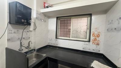 Kitchen Image of 1020 Sq.ft 1 BHK Builder Floor for rent in Gokhalenagar Pune for Rs. 25000