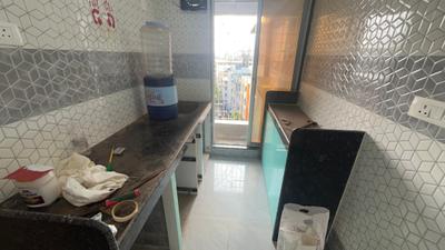Kitchen Image of 550 Sq.ft 1 BHK Apartment / Flat for rent in Kopar Khairane Navi Mumbai for Rs. 31000