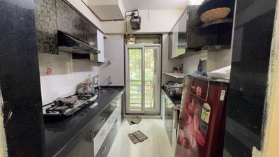 Kitchen Image of 850 Sq.ft 2 BHK Apartment / Flat for rent in RDC Pinewood, Kasarvadavali Thane for Rs. 27500